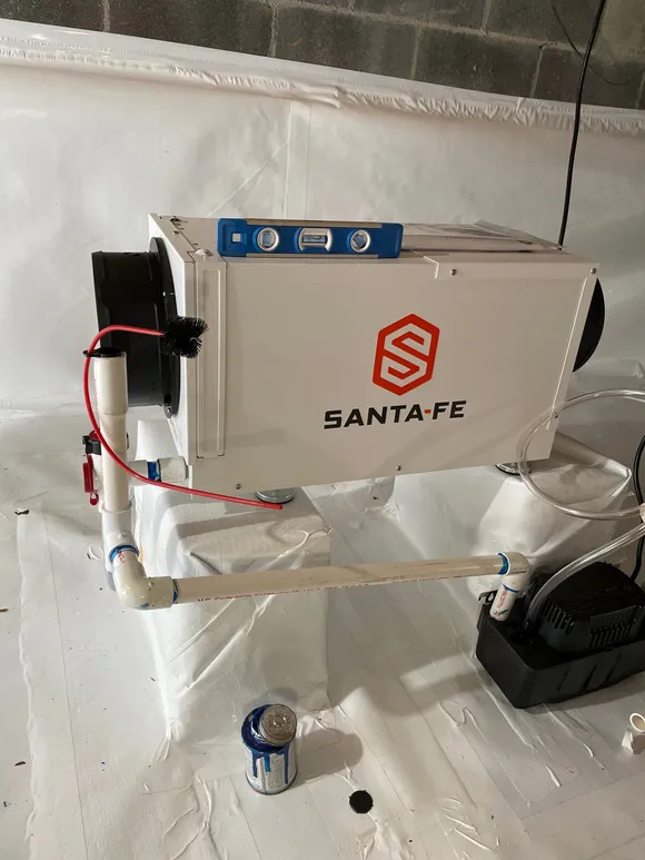 Santa Fe commercial dehumidifier installed in an encapsulated crawlspace